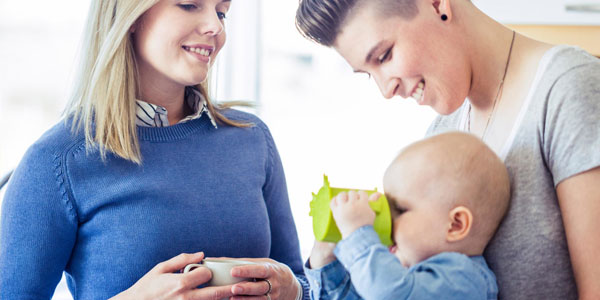 Young Couple With Baby